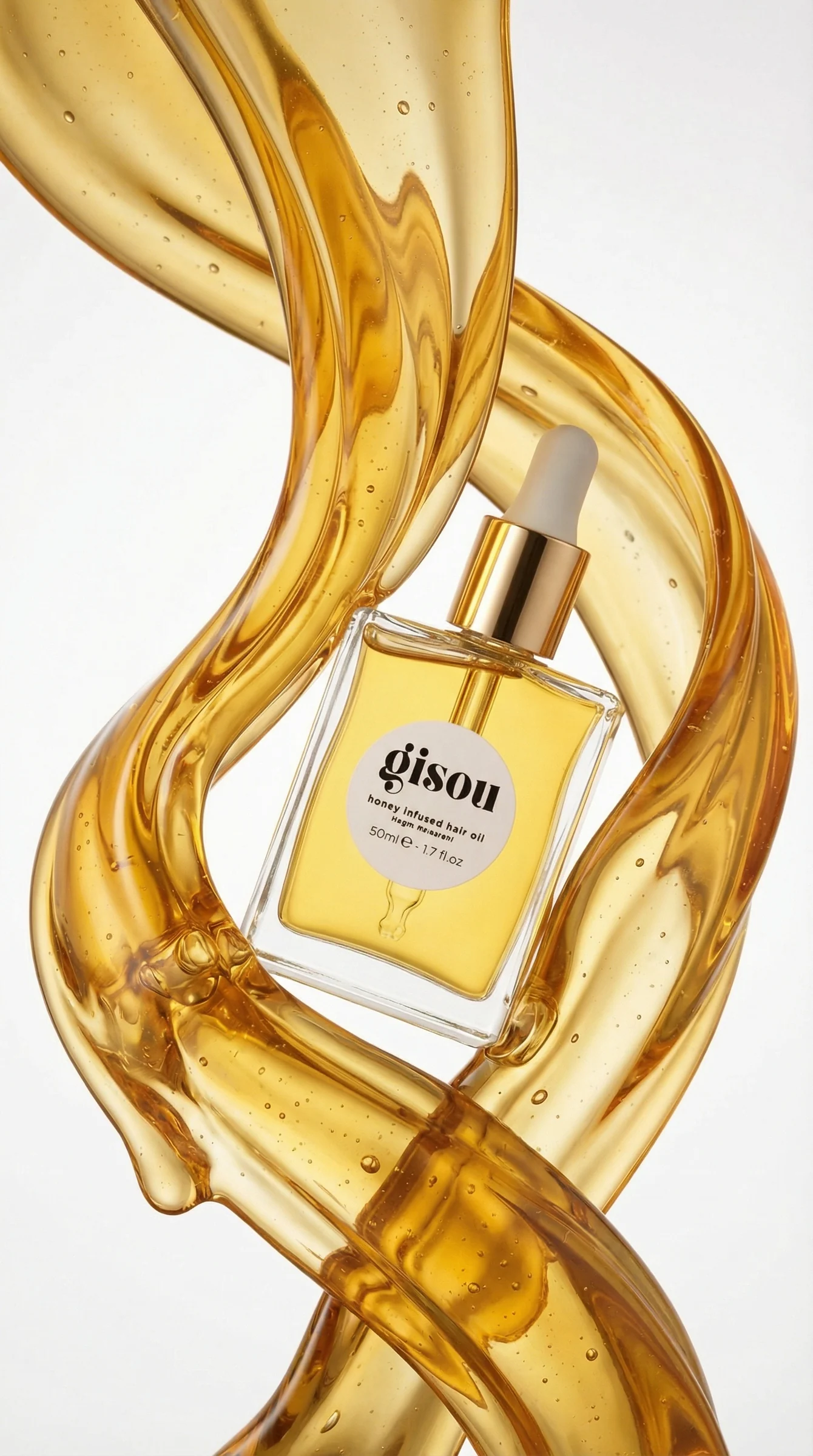 A bottle of honey-infused hair oil held inside a twisting ribbon of honey on a white ground